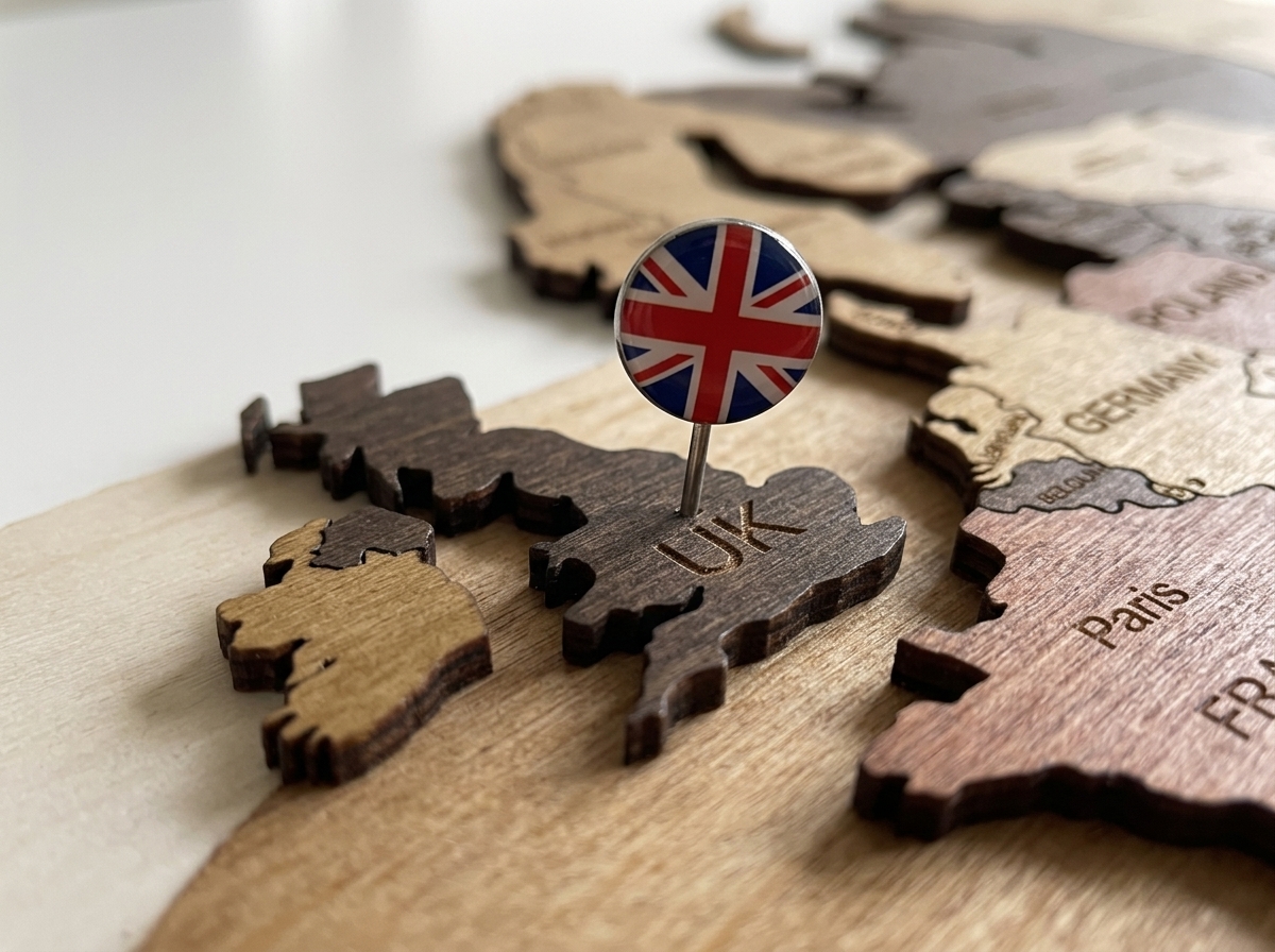 Pin being pressed into wood map surface